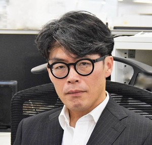 野村アセットマネジメントが設定・運用する「情報エレクトロニクスファンド」がファンド オブ ザ イヤー2020の国内株式型 部門で最優秀ファンド賞を受賞した。同ファンドの運用を担当している野村アセットマネジメントの運用部株式グループ シニア・ポートフォリオマネージャーの福田泰之氏(写真)に、同ファンドの運用のポイントについて聞いた。